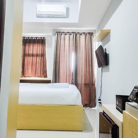 Comfy And Minimalist Studio At Vida View Apartment By Travelio Pampang Kültér fotó