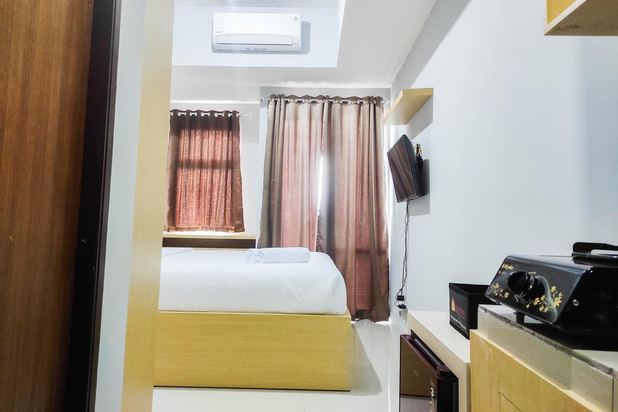 Comfy And Minimalist Studio At Vida View Apartment By Travelio Pampang Kültér fotó