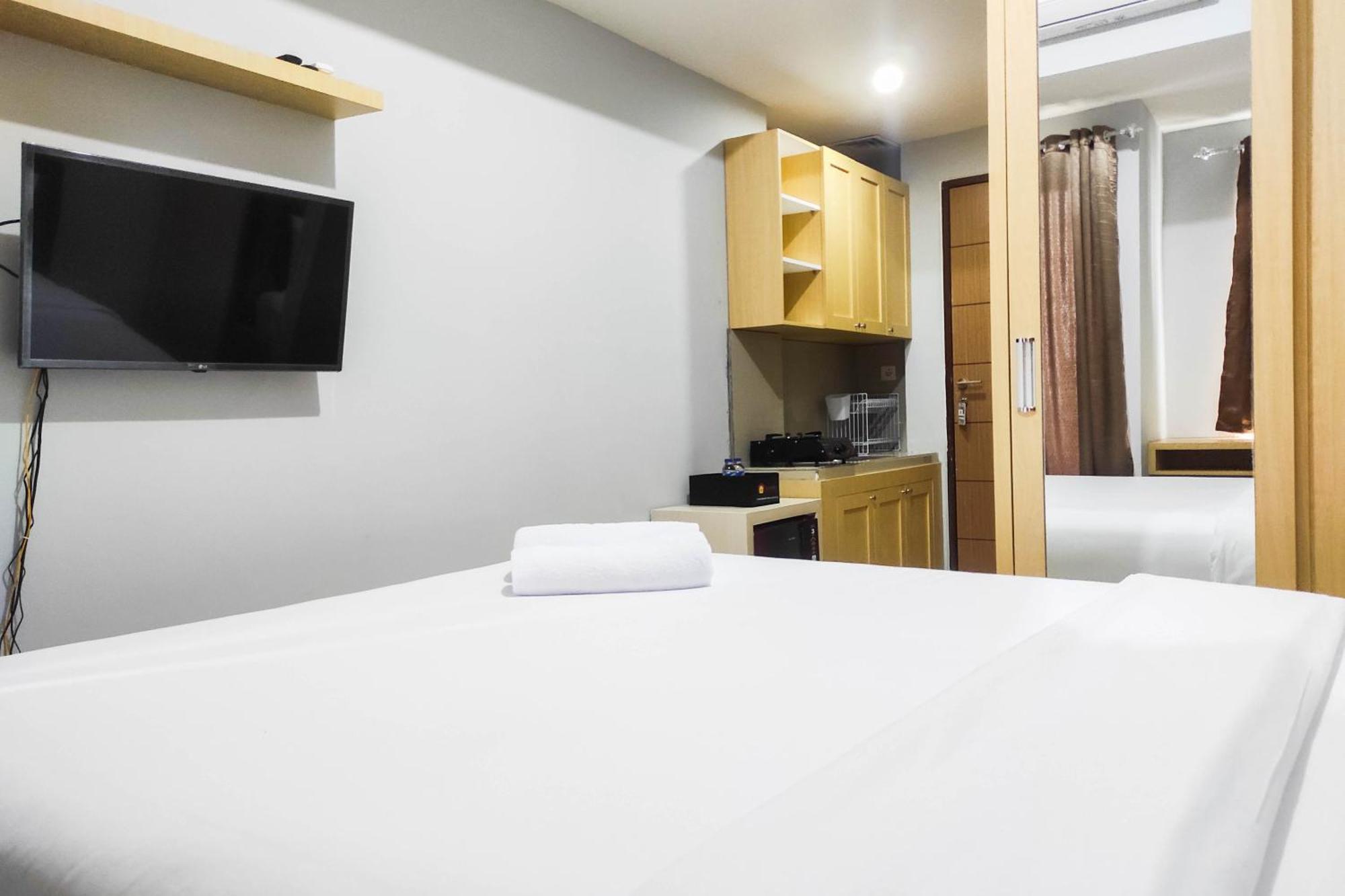 Comfy And Minimalist Studio At Vida View Apartment By Travelio Pampang Kültér fotó