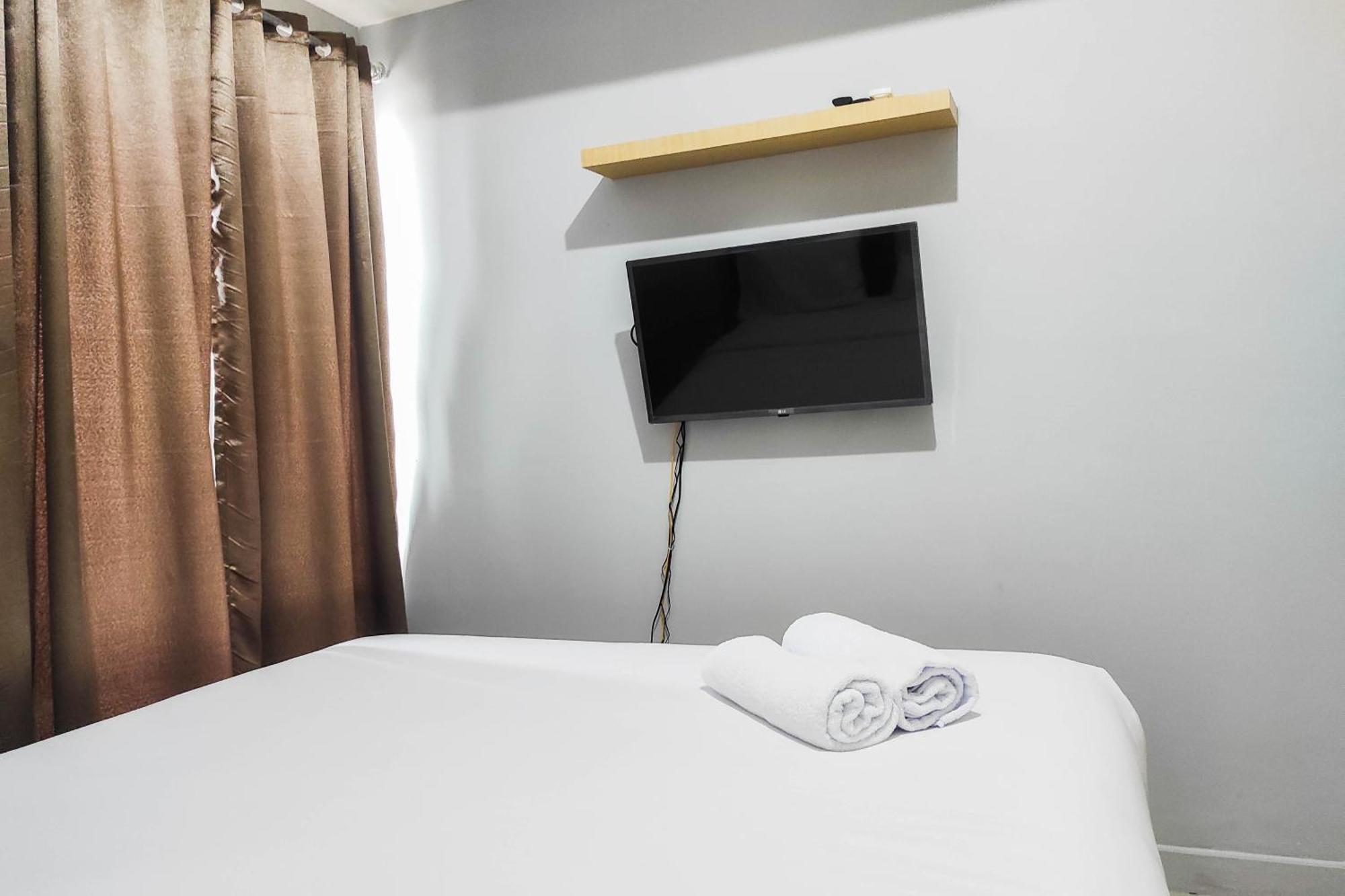 Comfy And Minimalist Studio At Vida View Apartment By Travelio Pampang Kültér fotó